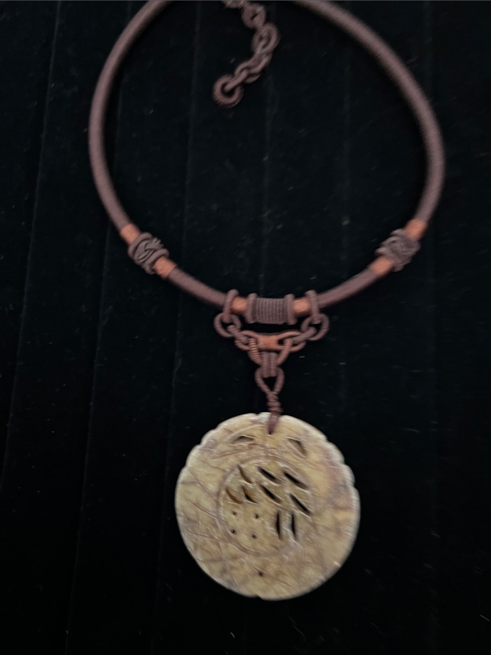 Brown Cord Necklace with Carved Round Pendant